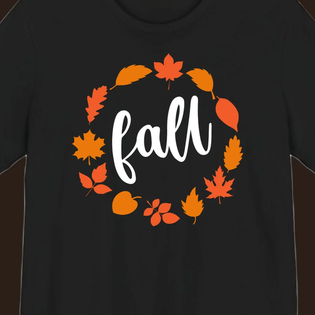 Fall leaves wreath with white script text.