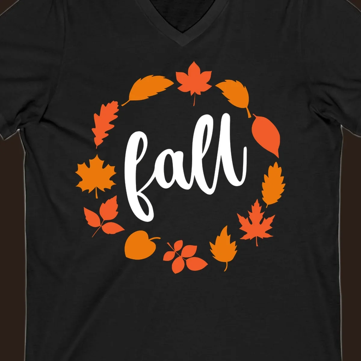 Fall leaves wreath with white script text.