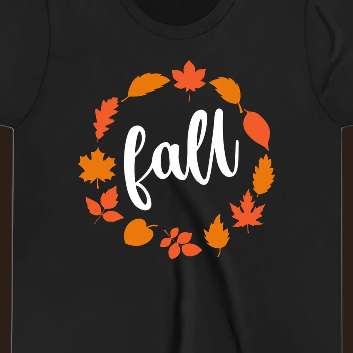 Fall leaves wreath with white script text.