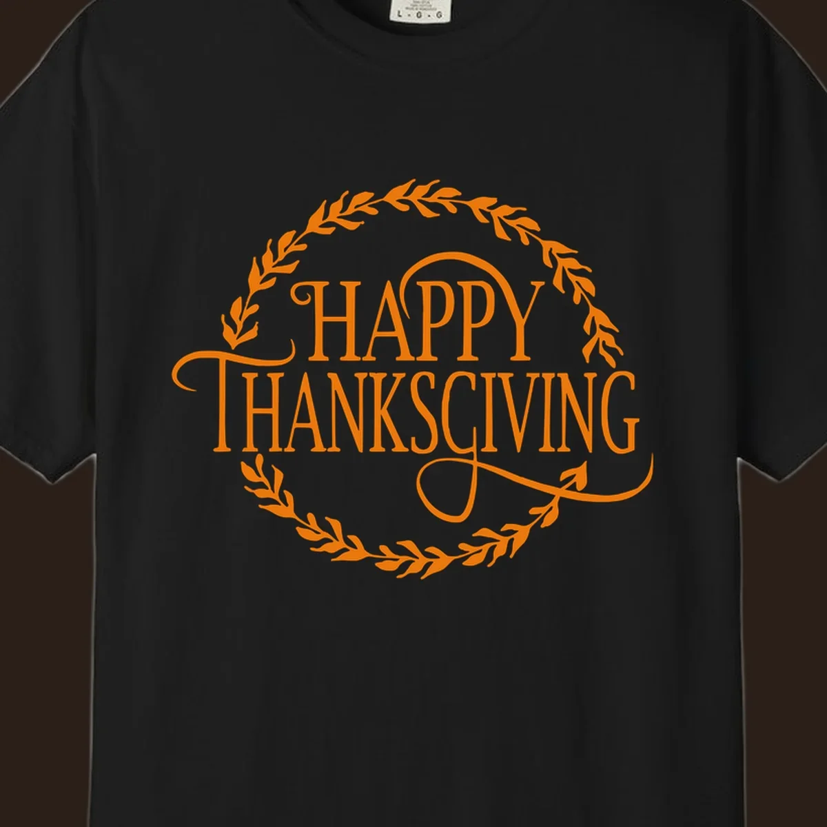 Happy Thanksgiving text with an orange leafy wreath.