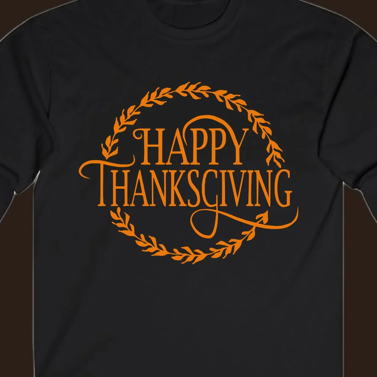 Happy Thanksgiving text with an orange leafy wreath.