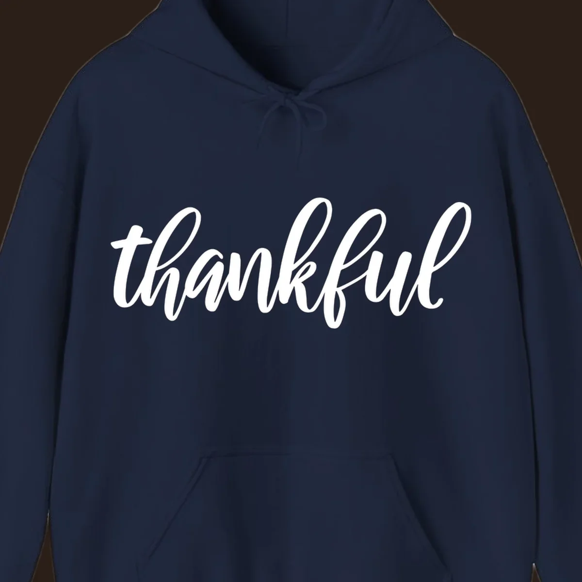 White script text spelling 'thankful' on a black background, representing thankful script word art.