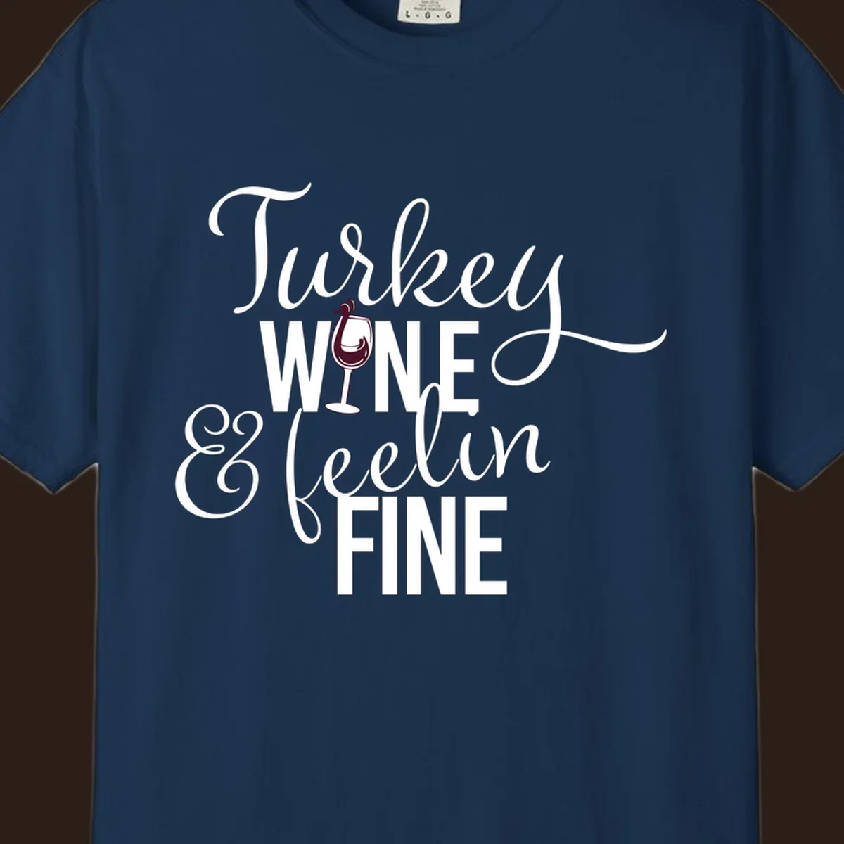 Turkey Wine Feelin Fine Thanksgiving design with text and wine glass illustration.