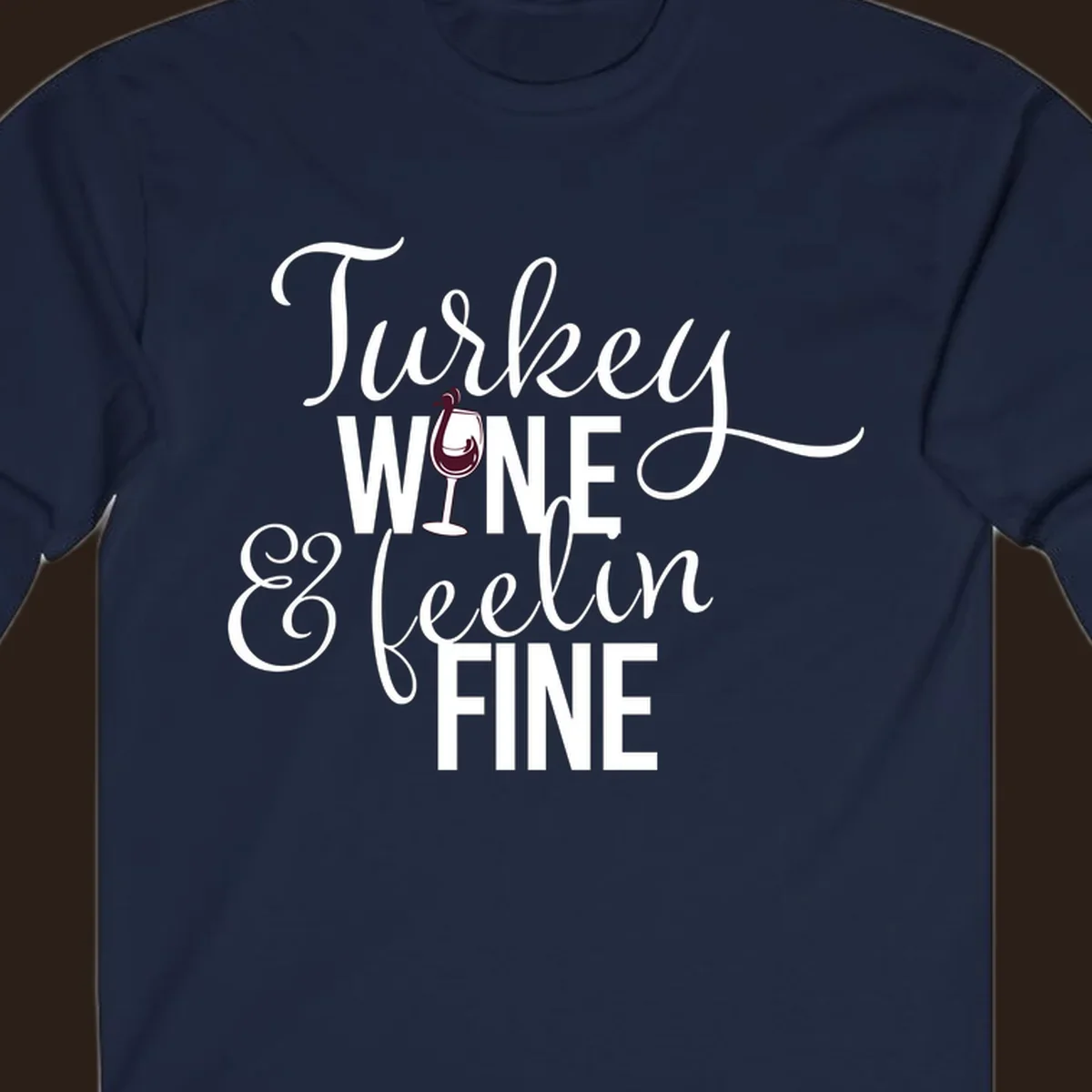 Turkey Wine Feelin Fine Thanksgiving design with text and wine glass illustration.