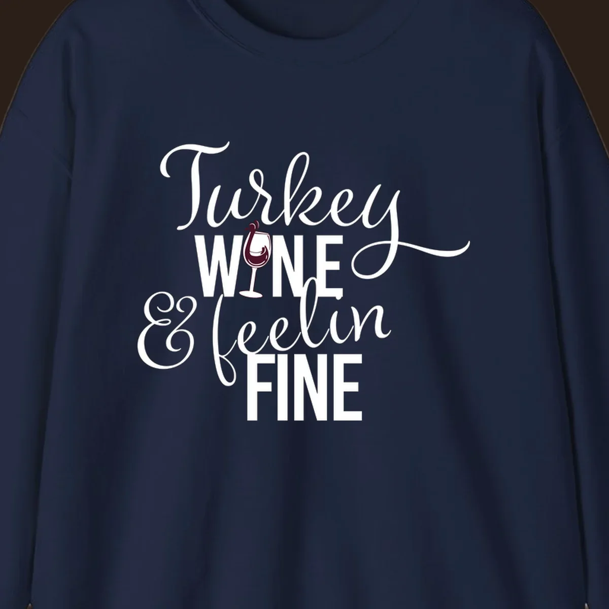 Turkey Wine Feelin Fine Thanksgiving design with text and wine glass illustration.