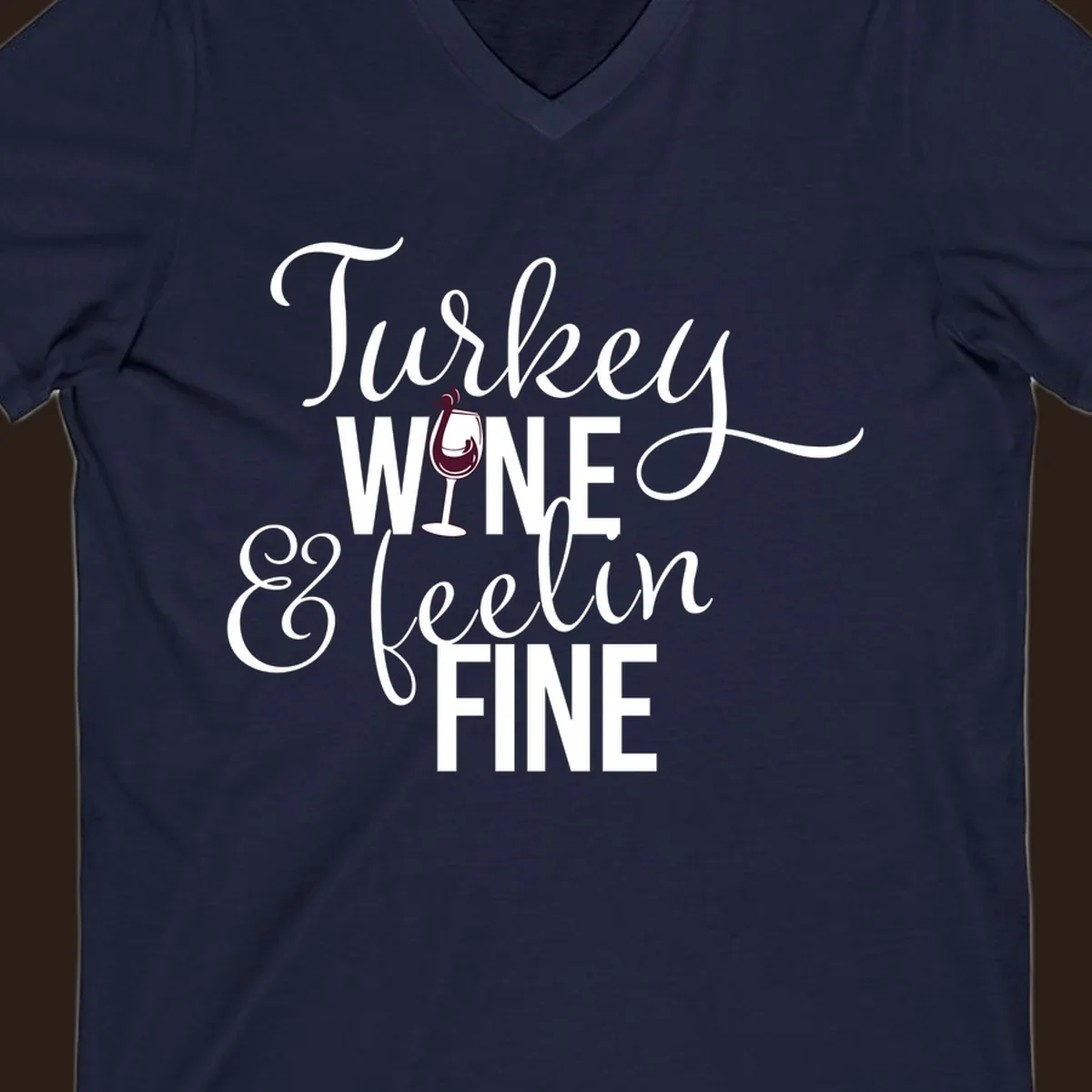 Turkey Wine Feelin Fine Thanksgiving design with text and wine glass illustration.