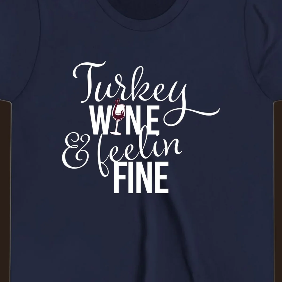 Turkey Wine Feelin Fine Thanksgiving design with text and wine glass illustration.