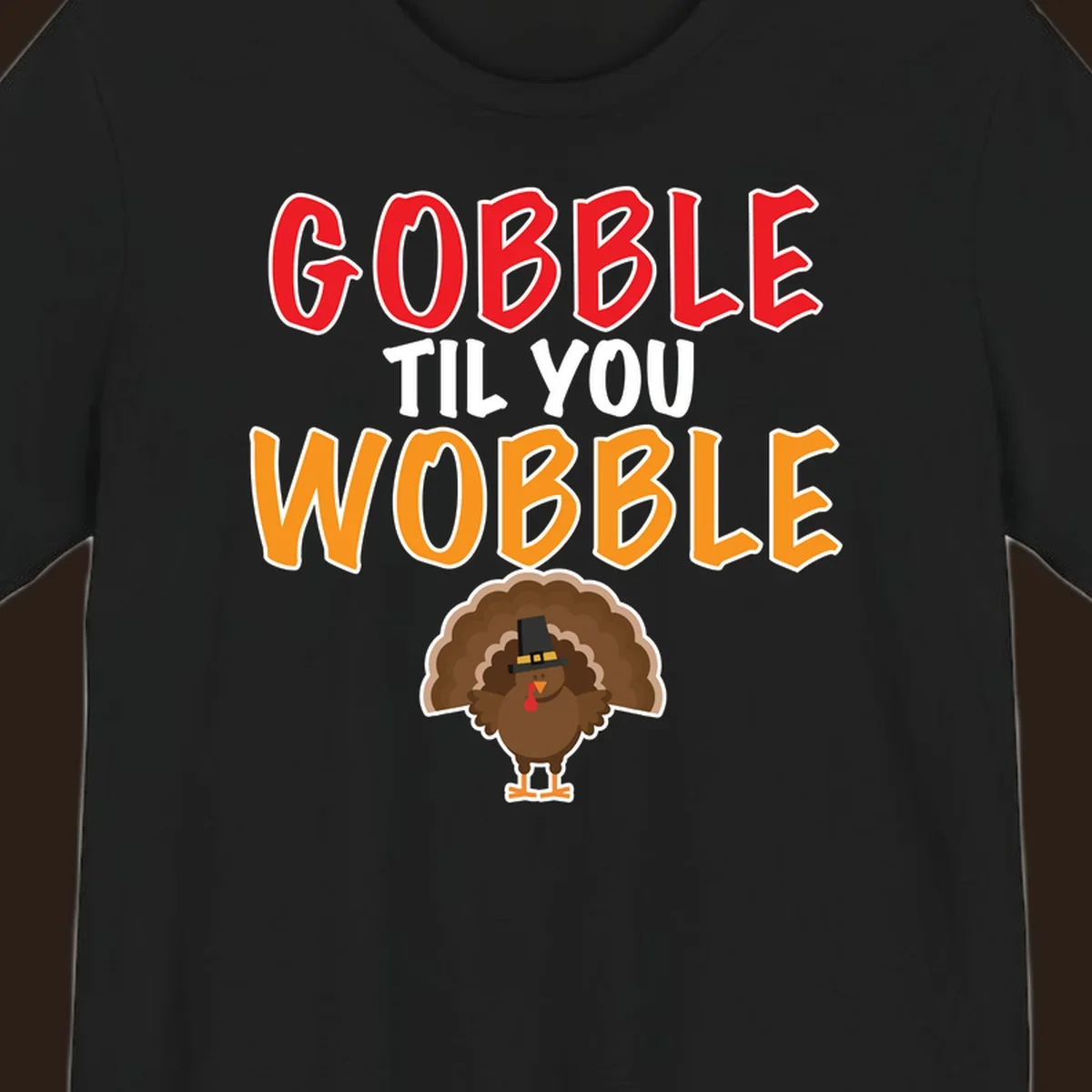 Gobble Til You Wobble text with a cartoon turkey wearing a pilgrim hat.