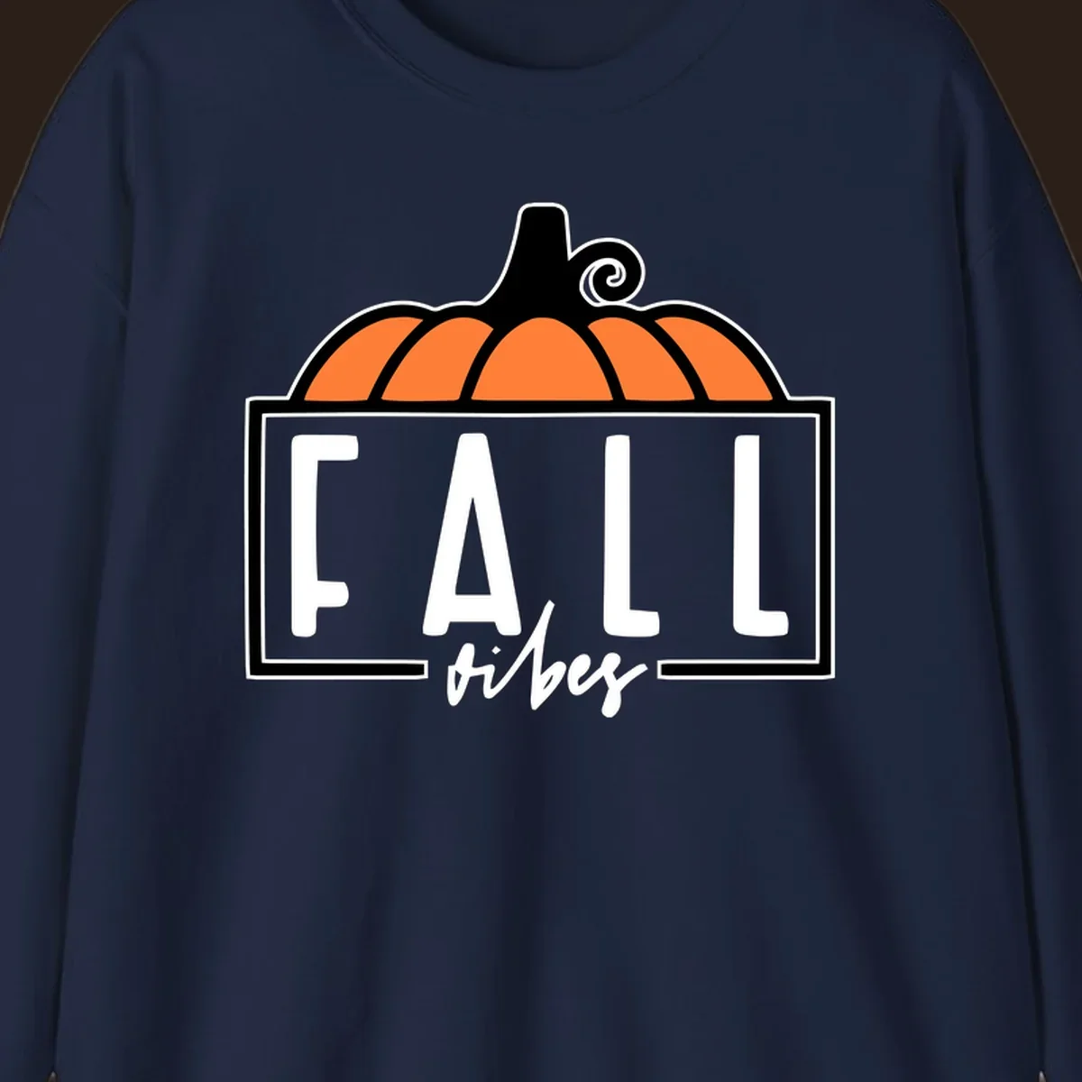 Fall vibes pumpkin graphic with text. Includes a pumpkin illustration and the words FALL and vibes.