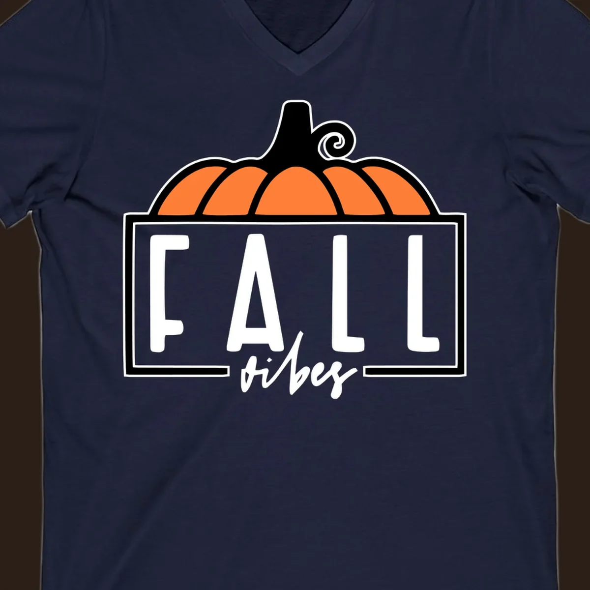 Fall vibes pumpkin graphic with text. Includes a pumpkin illustration and the words FALL and vibes.