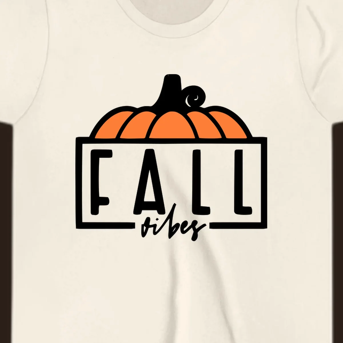 Fall vibes pumpkin graphic with text. Includes a pumpkin illustration and the words FALL and vibes.