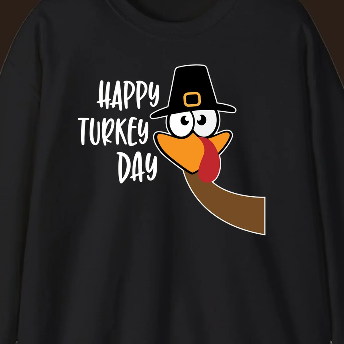 Happy Turkey Day text with a cartoon turkey wearing a pilgrim hat.