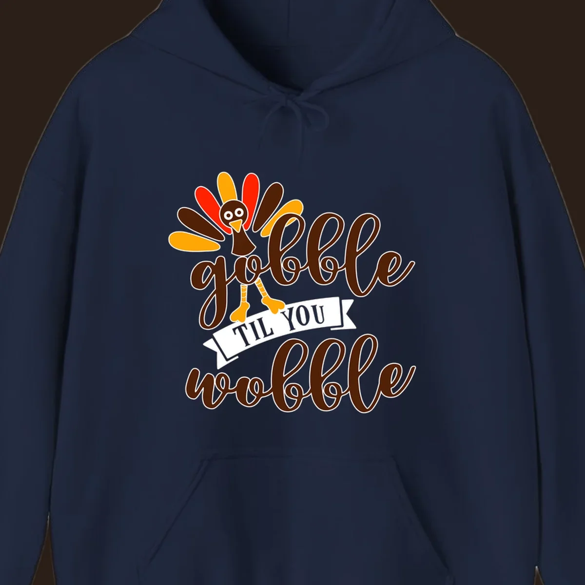 Gobble til you wobble turkey Thanksgiving illustration with colorful feathers and playful text.