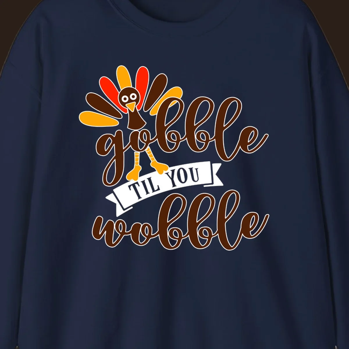 Gobble til you wobble turkey Thanksgiving illustration with colorful feathers and playful text.