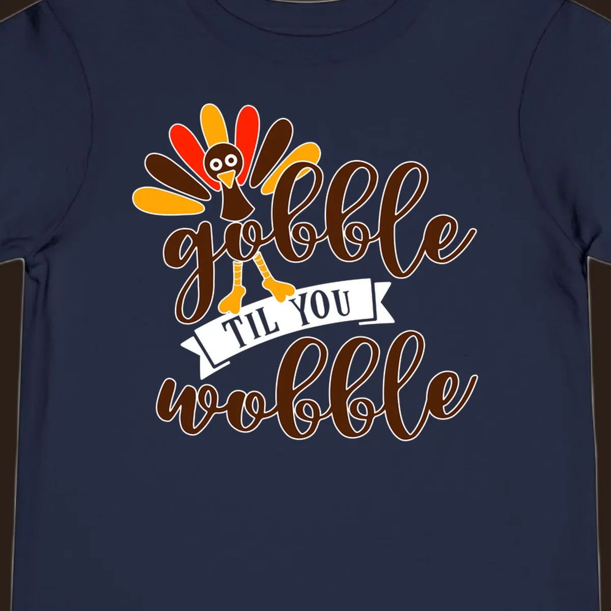 Gobble til you wobble turkey Thanksgiving illustration with colorful feathers and playful text.