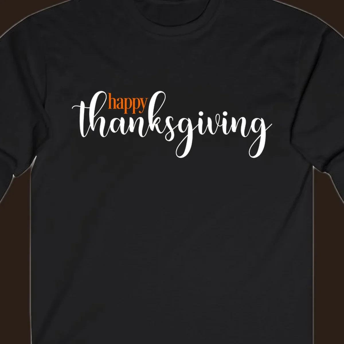 Happy Thanksgiving script design with orange 'happy' and white 'thanksgiving'.