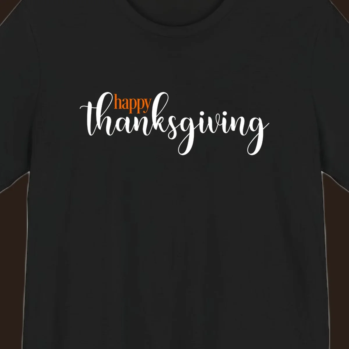 Happy Thanksgiving script design with orange 'happy' and white 'thanksgiving'.