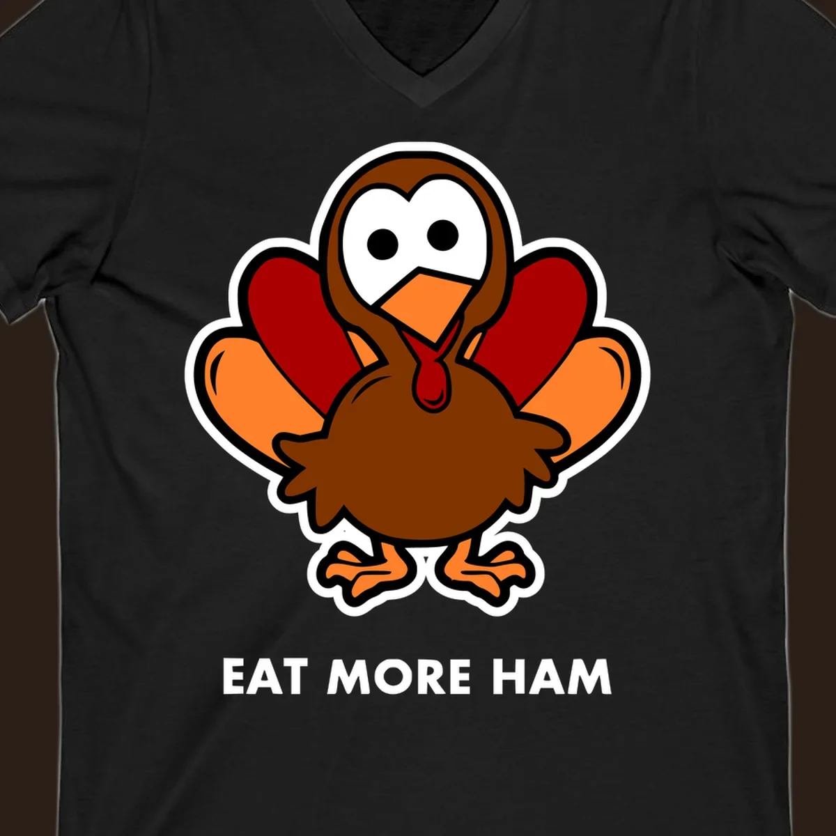 Cartoon turkey with 'Eat More Ham' text, promoting a fun Thanksgiving alternative.
