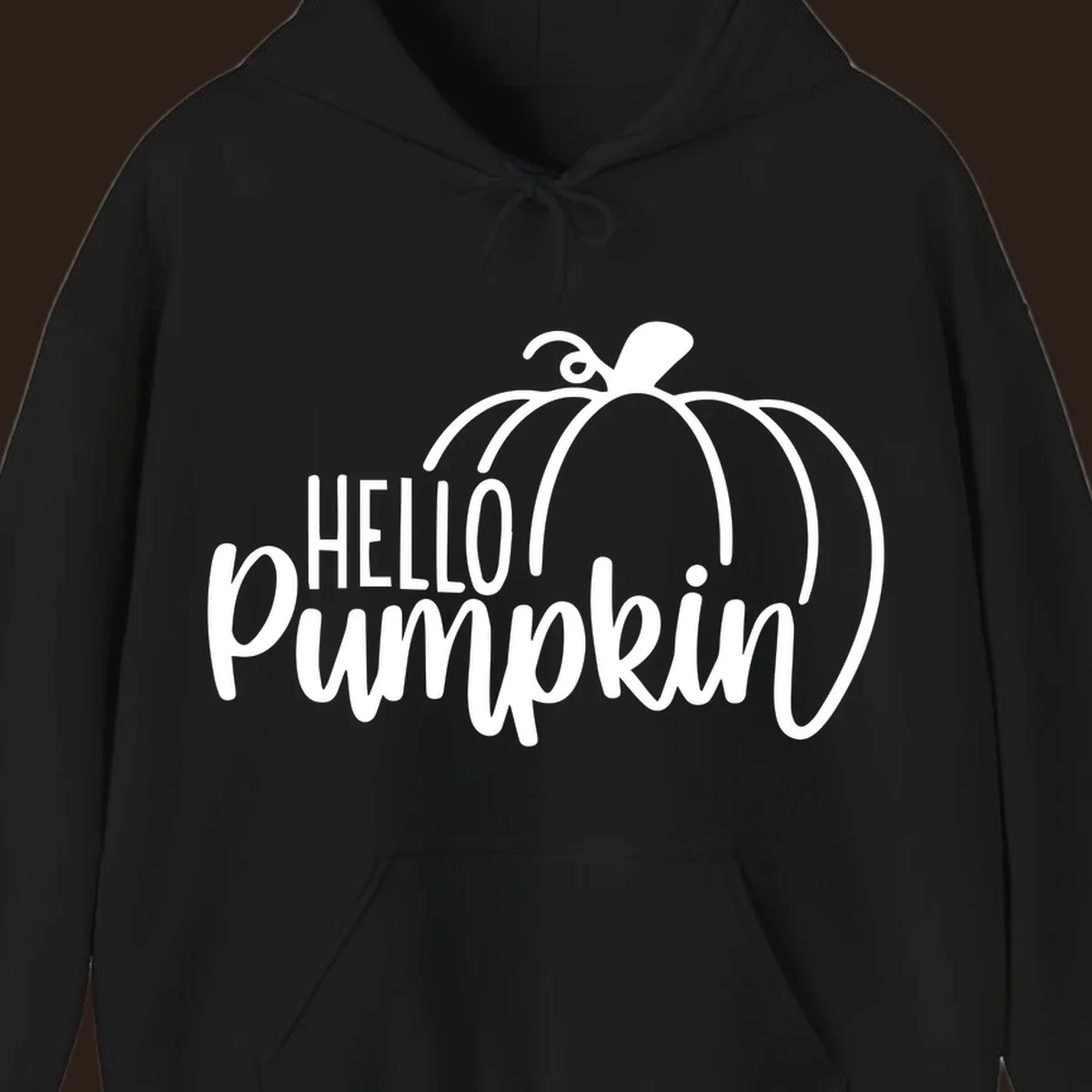 White hello pumpkin text with a pumpkin illustration, autumn holiday design
