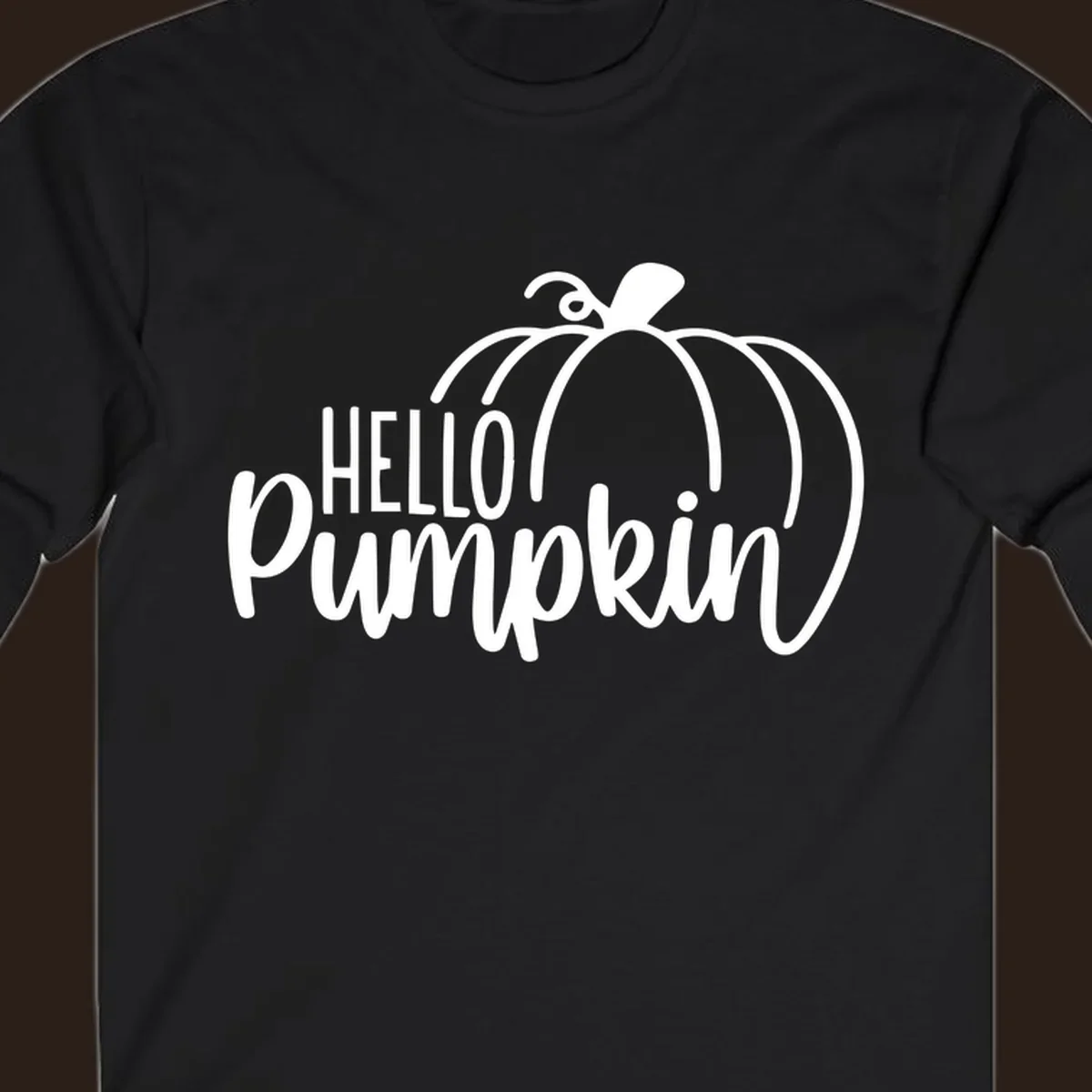 White hello pumpkin text with a pumpkin illustration, autumn holiday design