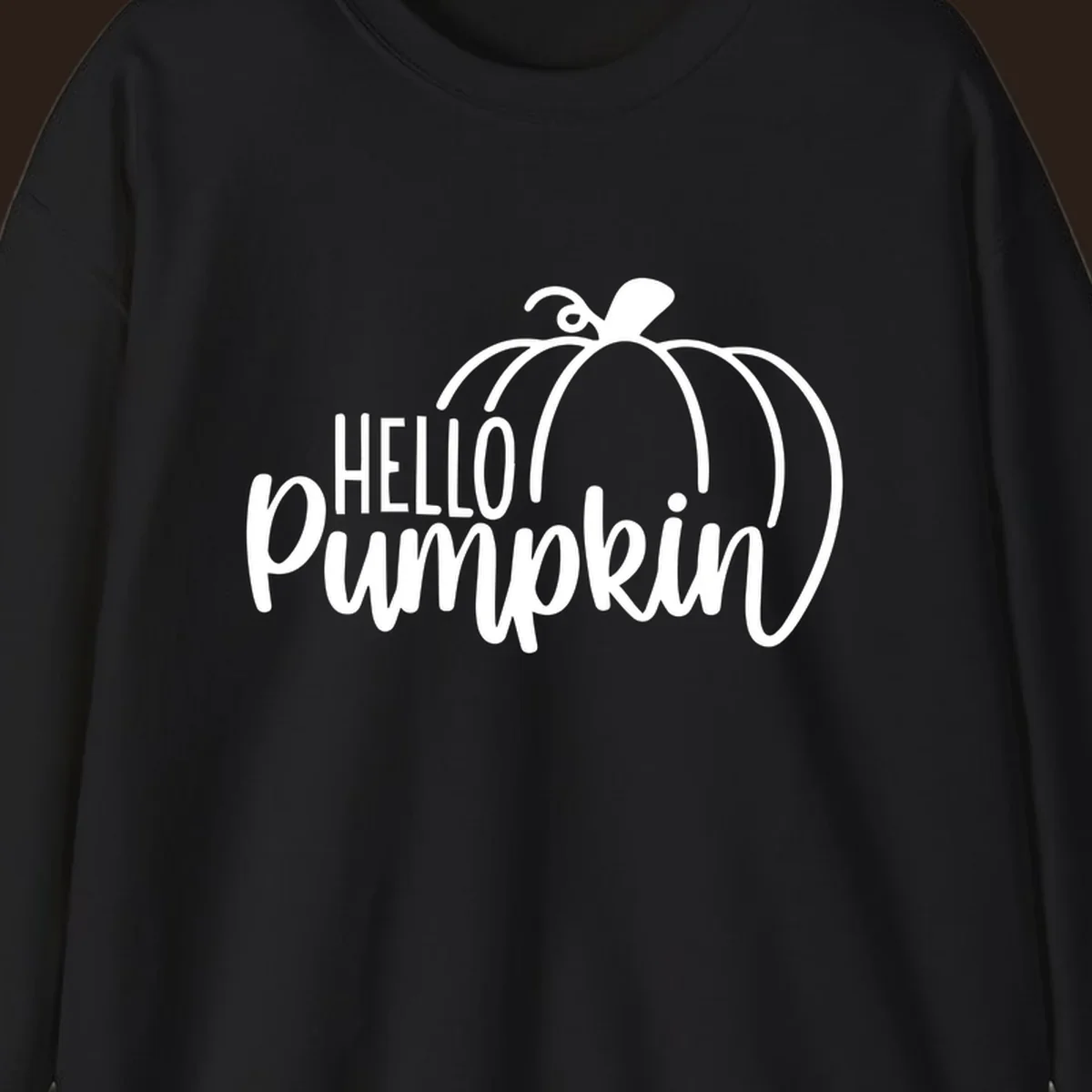 White hello pumpkin text with a pumpkin illustration, autumn holiday design