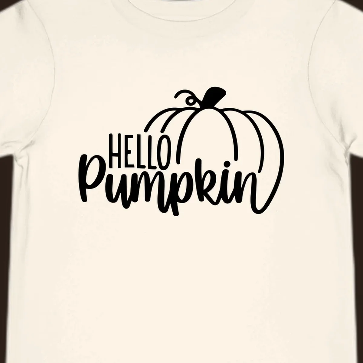 White hello pumpkin text with a pumpkin illustration, autumn holiday design
