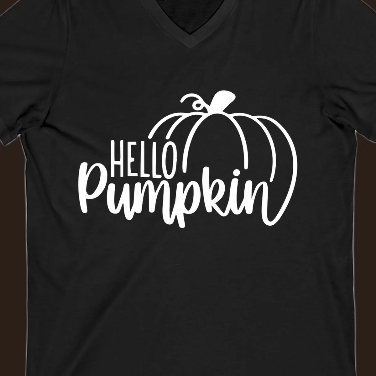 White hello pumpkin text with a pumpkin illustration, autumn holiday design