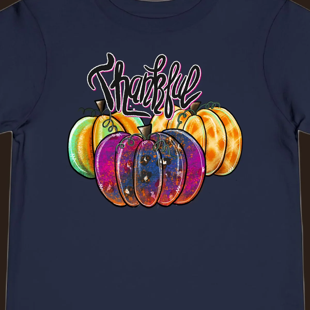 Fall pumpkin patch thankful script design. Colorful pumpkins with text.