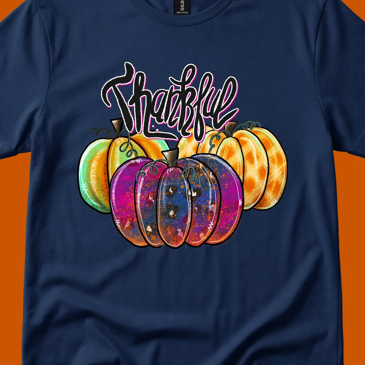 Fall pumpkin patch thankful script design. Colorful pumpkins with text.