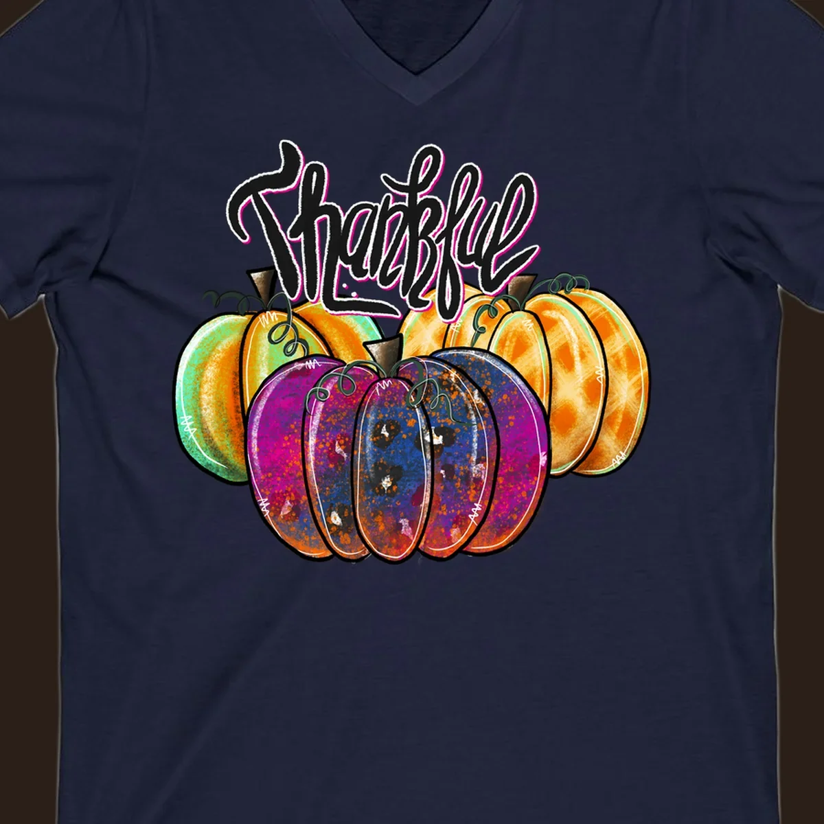 Fall pumpkin patch thankful script design. Colorful pumpkins with text.