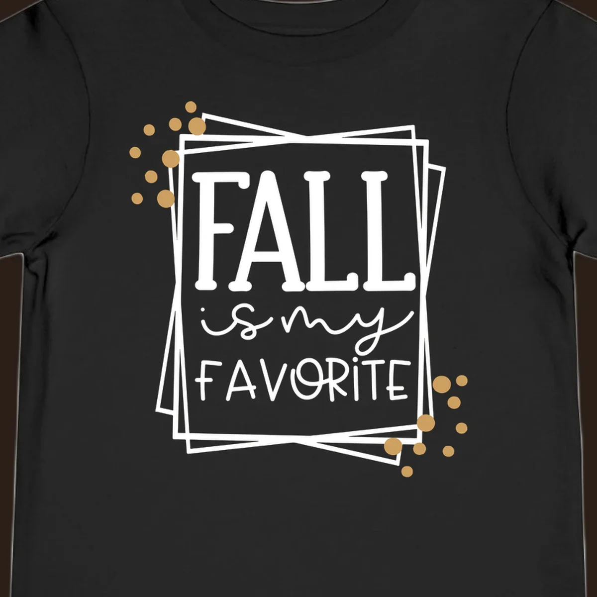 Fall is my favorite phrase typography design with white and gold accents on a black background.