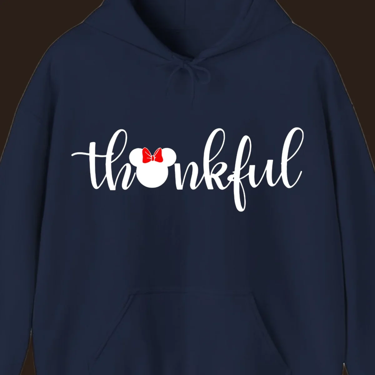 Minnie Mouse silhouette replaces the 'o' in the word 'thankful' in a script font.
