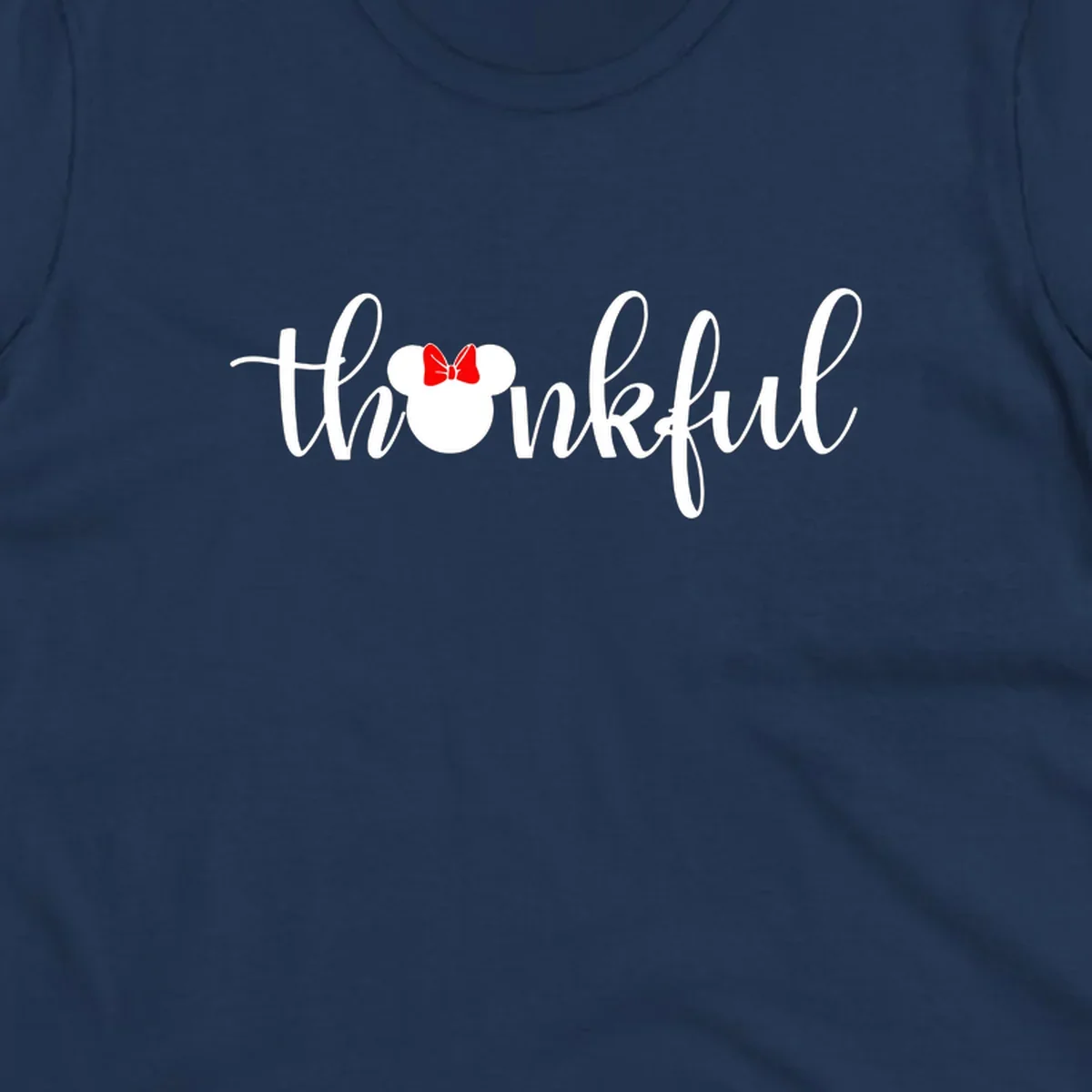Minnie Mouse silhouette replaces the 'o' in the word 'thankful' in a script font.