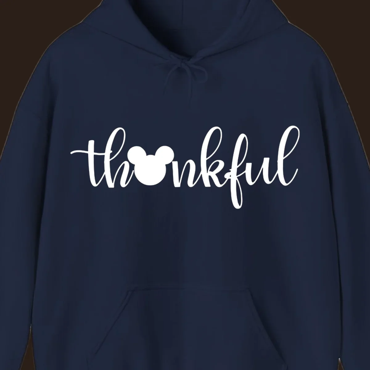 Script text 'thankful' with Mickey Mouse head silhouette replacing the 'o', in white and black variants.