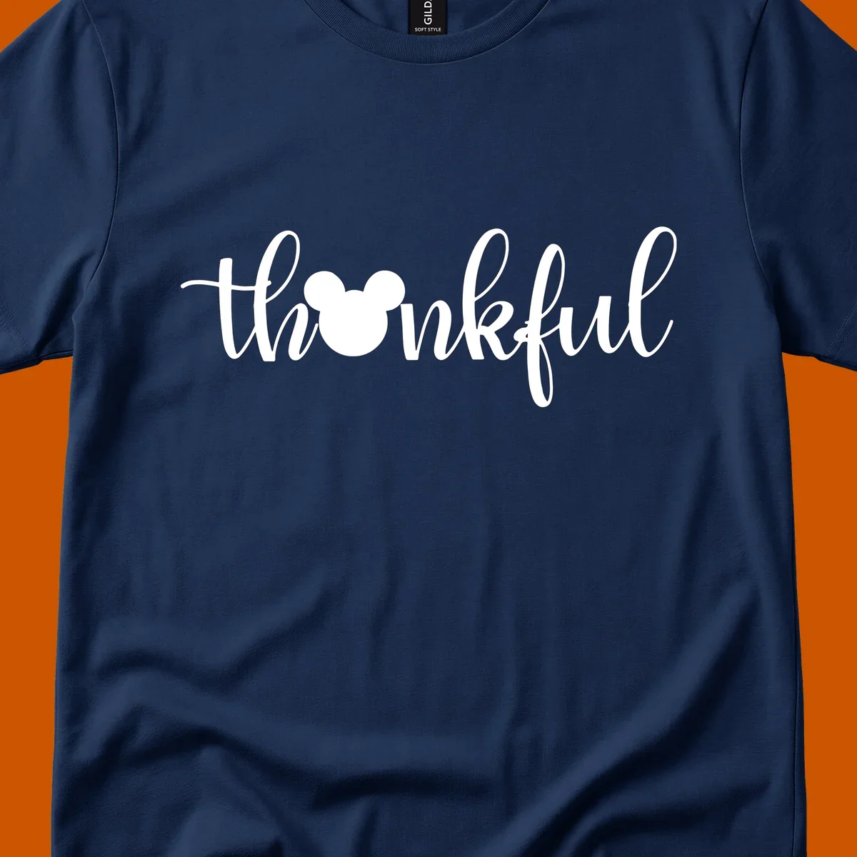 Script text 'thankful' with Mickey Mouse head silhouette replacing the 'o', in white and black variants.