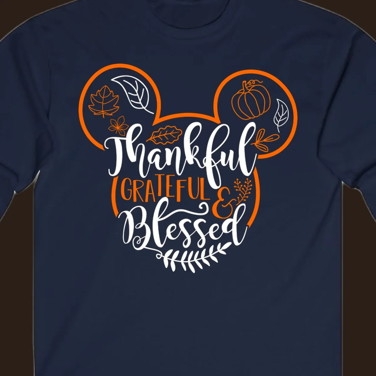 Thanksgiving Mickey Mouse head design with text Thankful GRATEFUL & Blessed and fall icons.