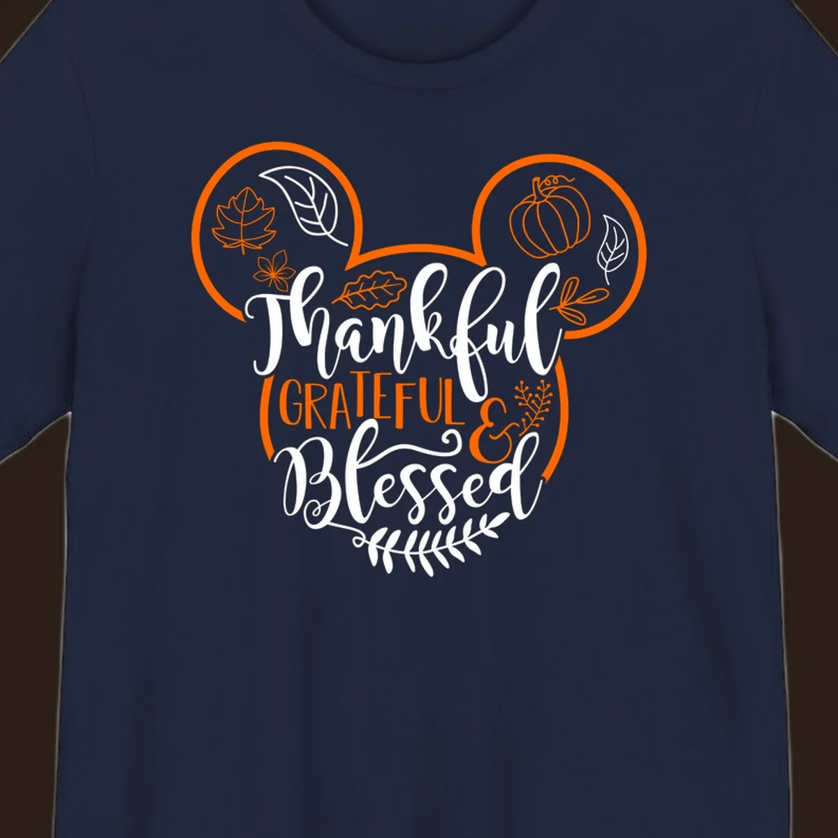 Thanksgiving Mickey Mouse head design with text Thankful GRATEFUL & Blessed and fall icons.