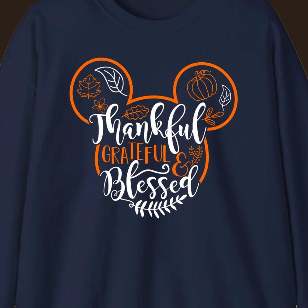 Thanksgiving Mickey Mouse head design with text Thankful GRATEFUL & Blessed and fall icons.