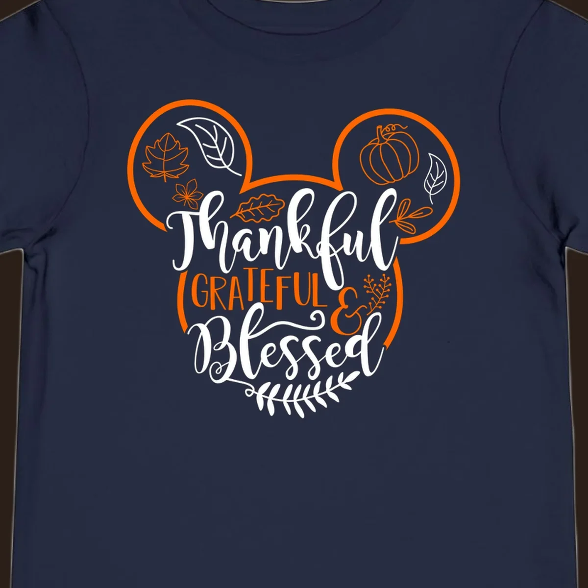 Thanksgiving Mickey Mouse head design with text Thankful GRATEFUL & Blessed and fall icons.