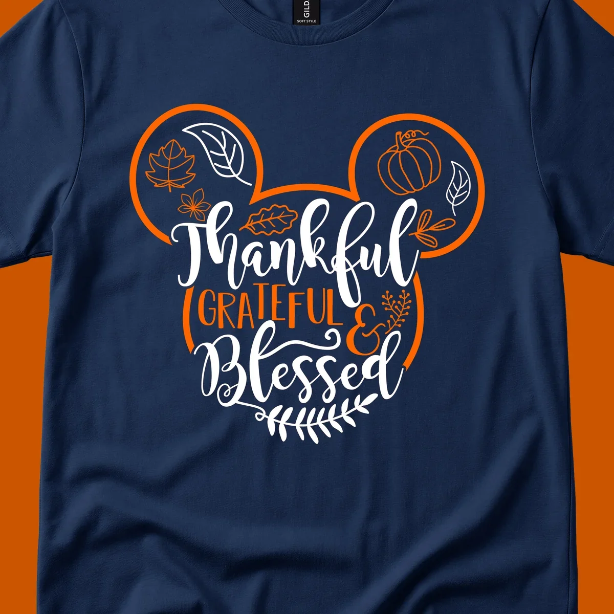Thanksgiving Mickey Mouse head design with text Thankful GRATEFUL & Blessed and fall icons.