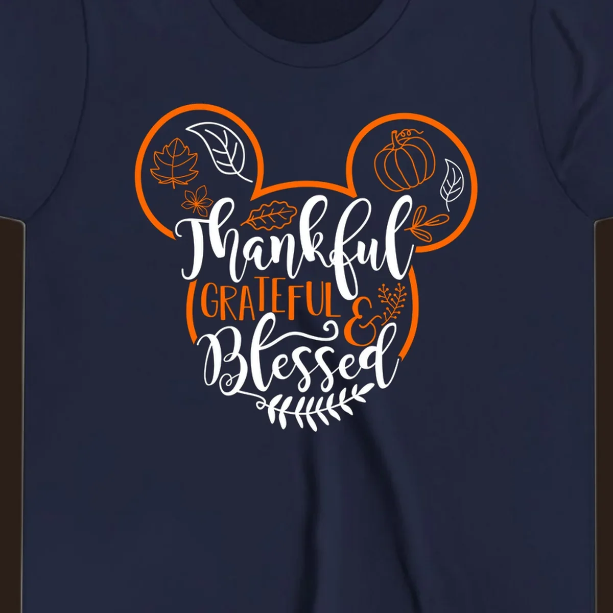 Thanksgiving Mickey Mouse head design with text Thankful GRATEFUL & Blessed and fall icons.