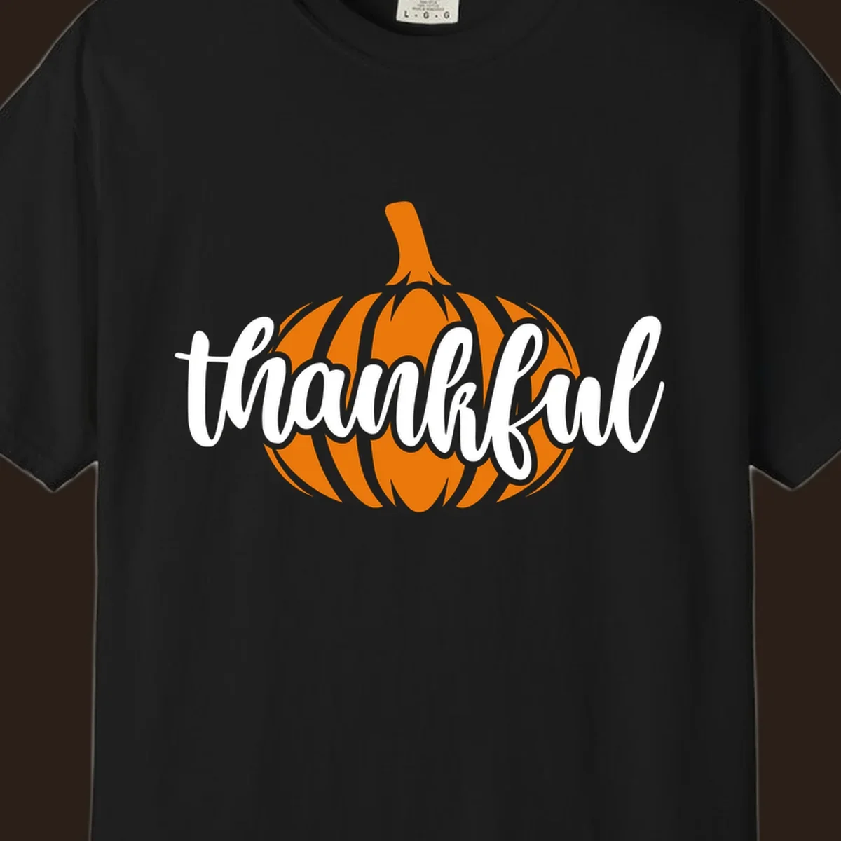 Fall thankful pumpkin script text graphic tee shirt design.