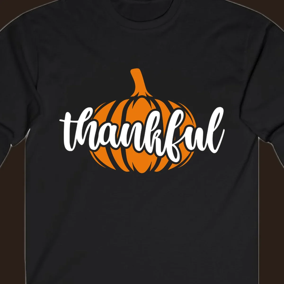 Fall thankful pumpkin script text graphic tee shirt design.