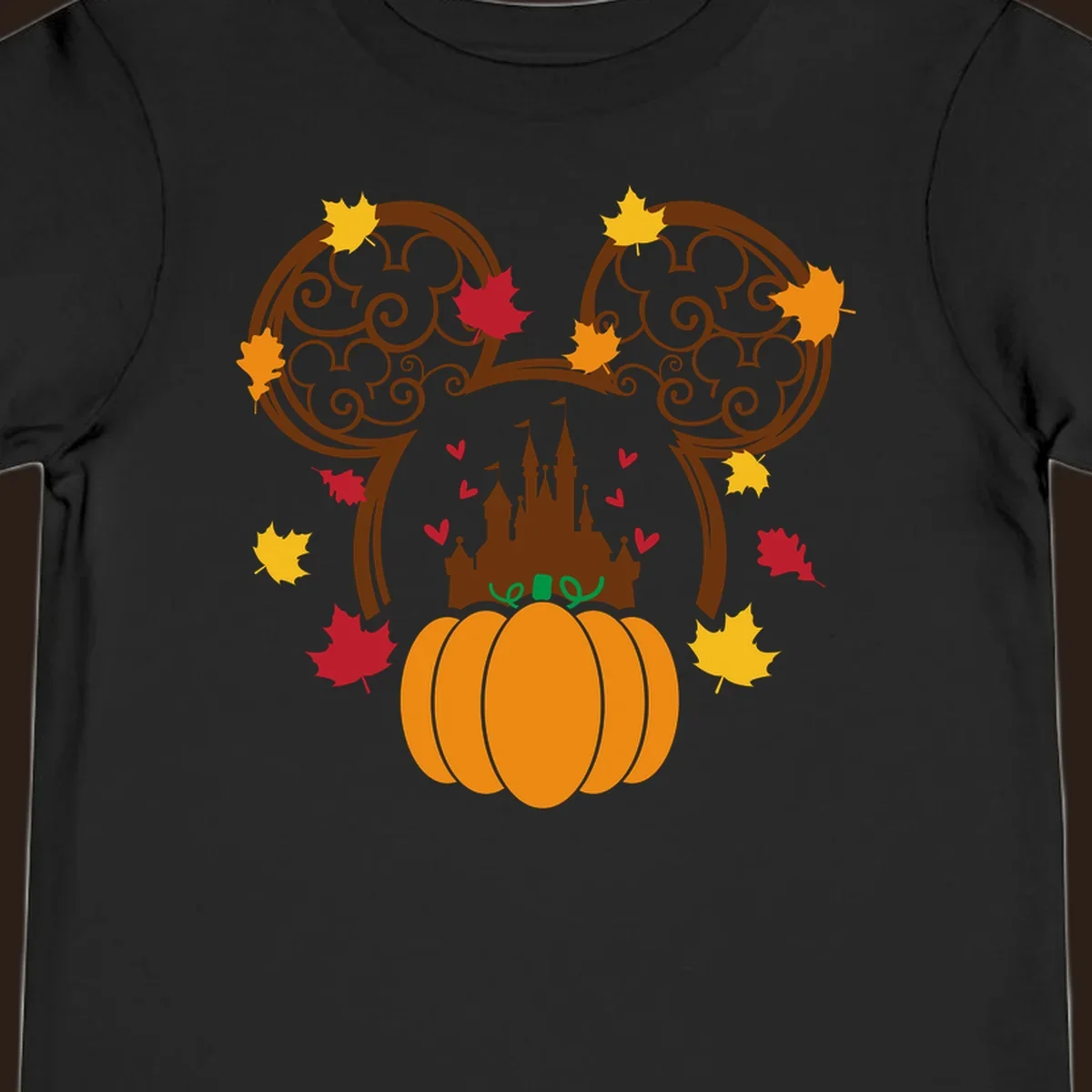 Disney fall pumpkin castle Mickey ears design with autumn leaves.