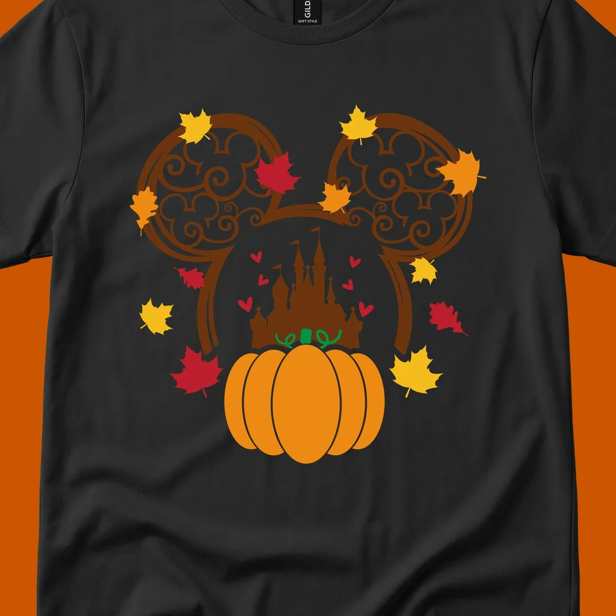Disney fall pumpkin castle Mickey ears design with autumn leaves.