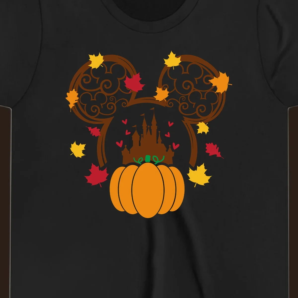 Disney fall pumpkin castle Mickey ears design with autumn leaves.