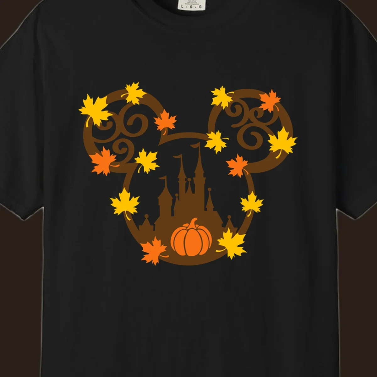 Autumn mickey castle graphic with pumpkin and maple leaves.
