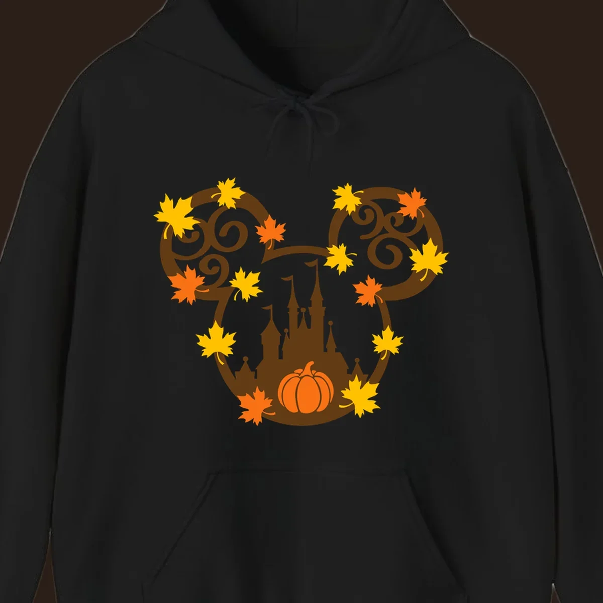 Autumn mickey castle graphic with pumpkin and maple leaves.