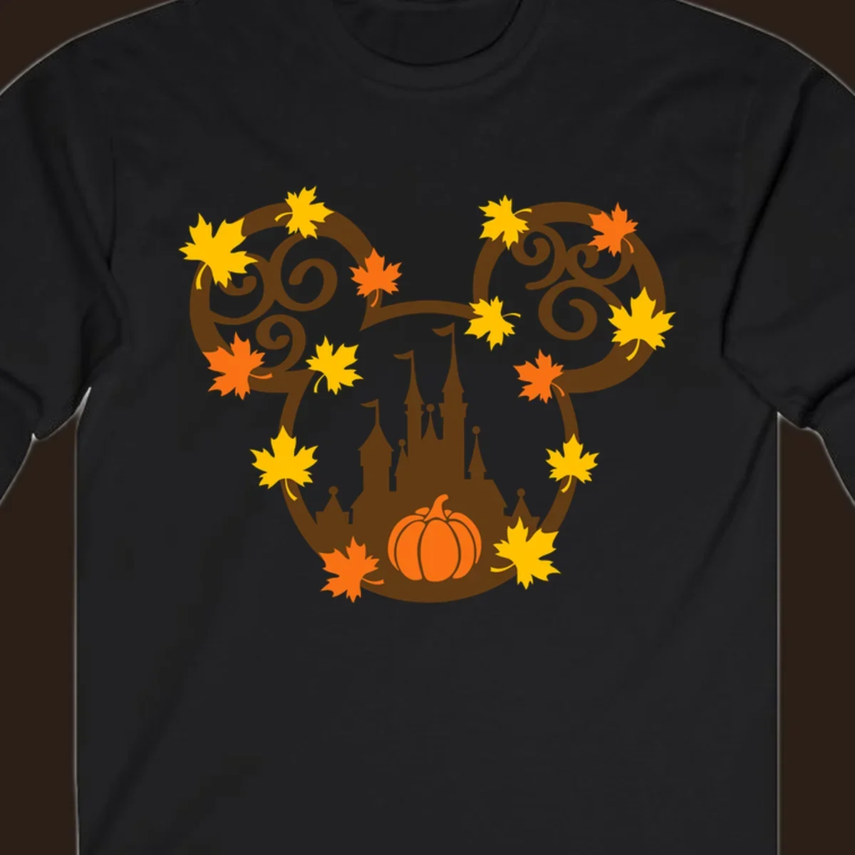 Autumn mickey castle graphic with pumpkin and maple leaves.