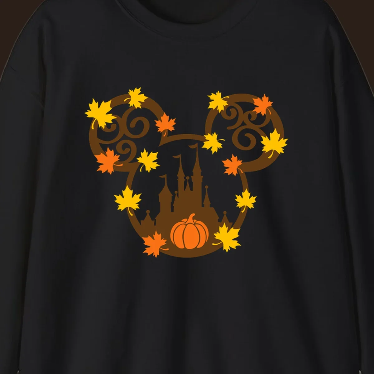 Autumn mickey castle graphic with pumpkin and maple leaves.